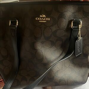 Coach Black and Brown Leather Tote with Structured Design
